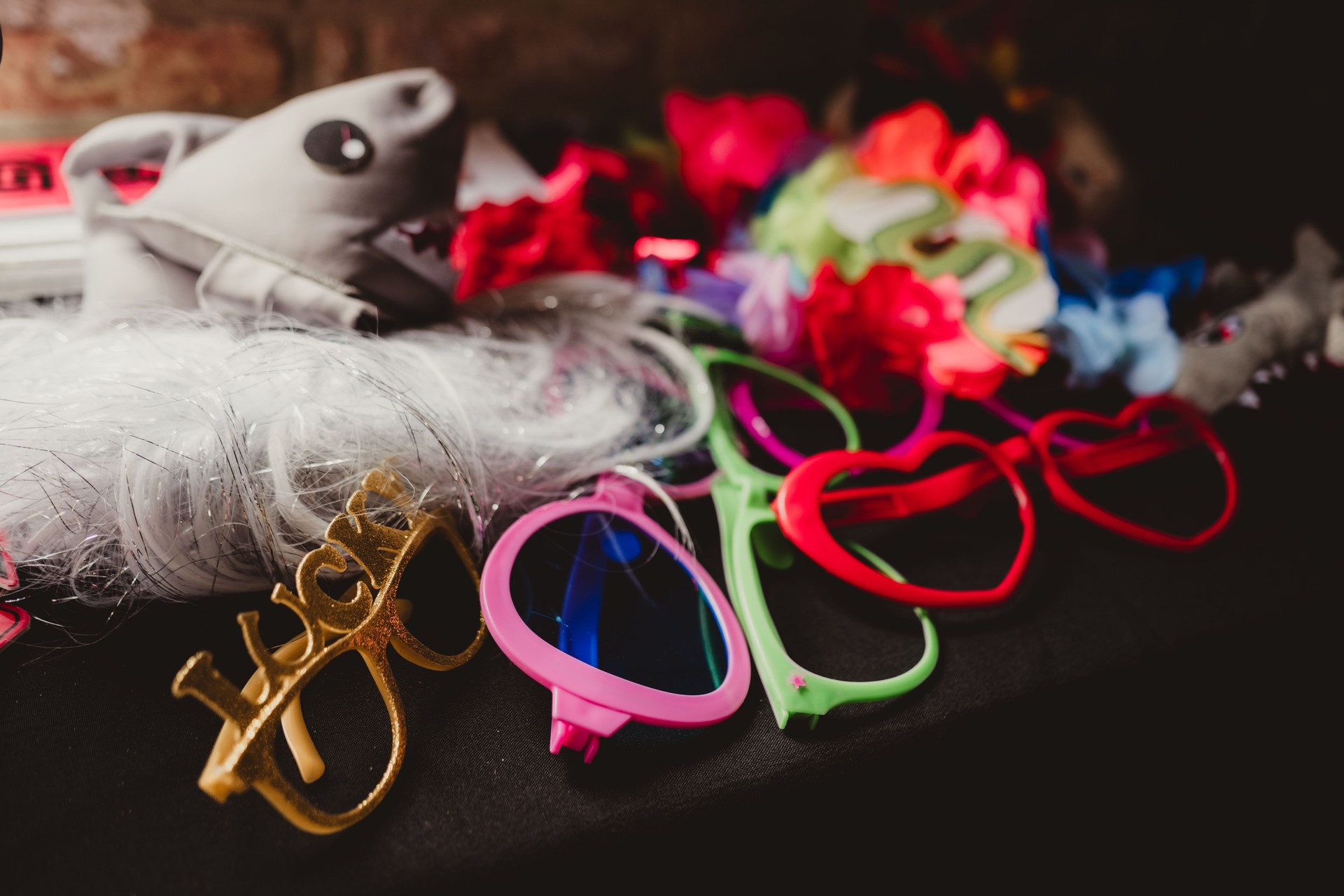 Photo Booth props on table at wedding reception